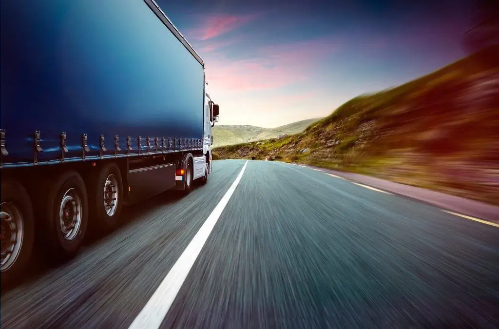 Curtainsider lorry on the road